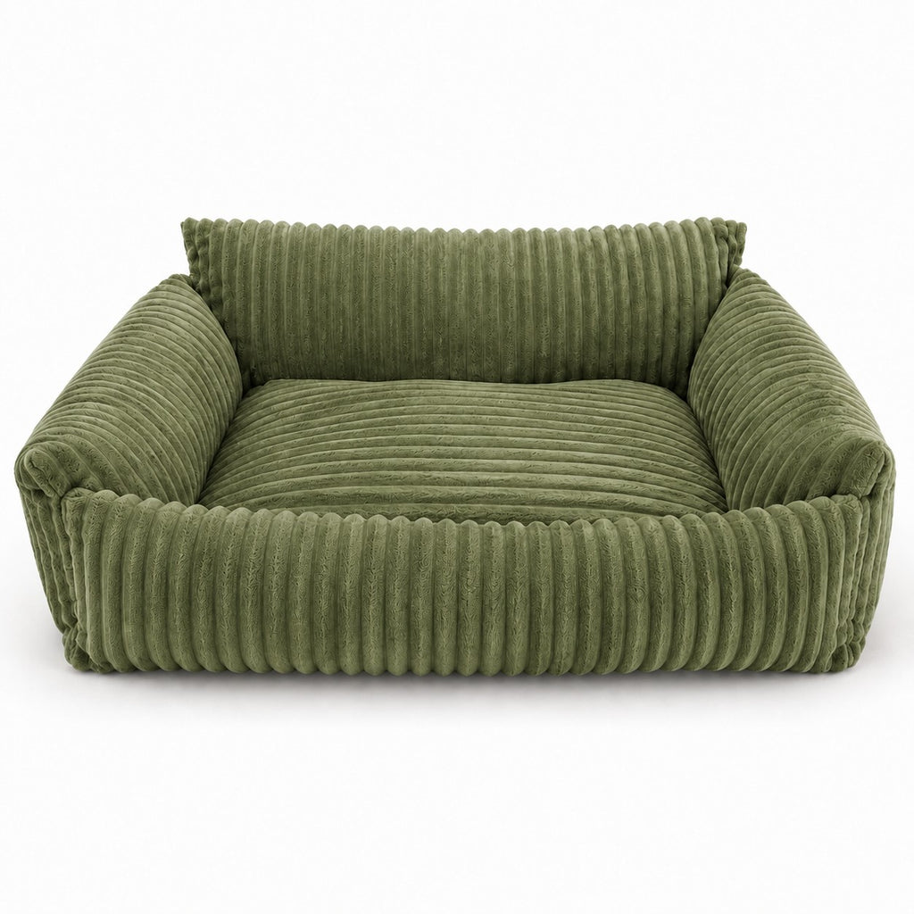Lodie dog sofa in green corduroy, with padded armrests and backrest